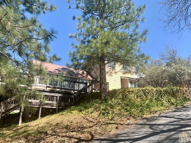 45864 Upndown Rd, Posey, CA 93260 - view of side of home with a deck and metal roof