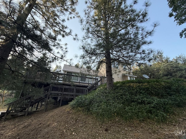 45864 Upndown Rd, Posey, CA 93260 - back of property with a deck, metal roof, and stairs
