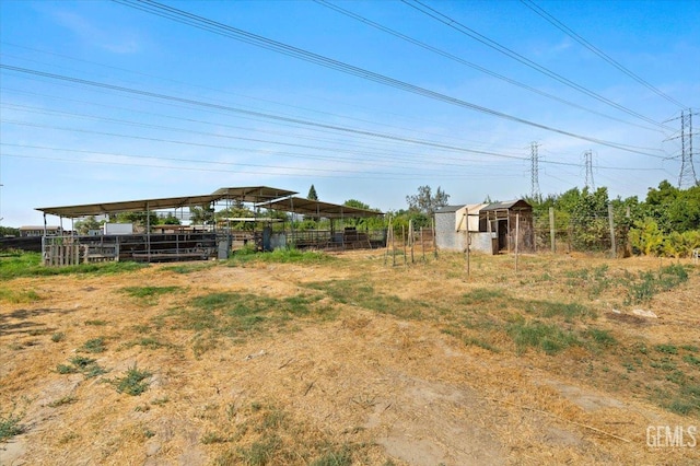 22940 Fast Ct, Bakersfield, CA 93314 - view of yard featuring an outdoor structure and an exterior structure