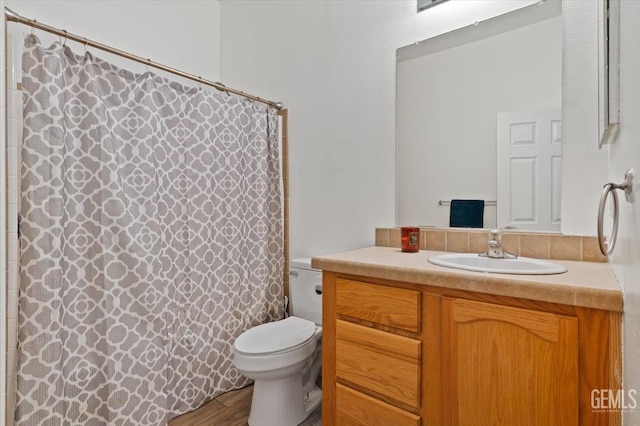 22940 Fast Ct, Bakersfield, CA 93314 - bathroom with vanity, wood finished floors, and curtained shower
