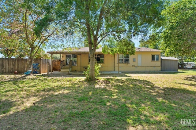 22940 Fast Ct, Bakersfield, CA 93314 - back of house featuring a storage unit