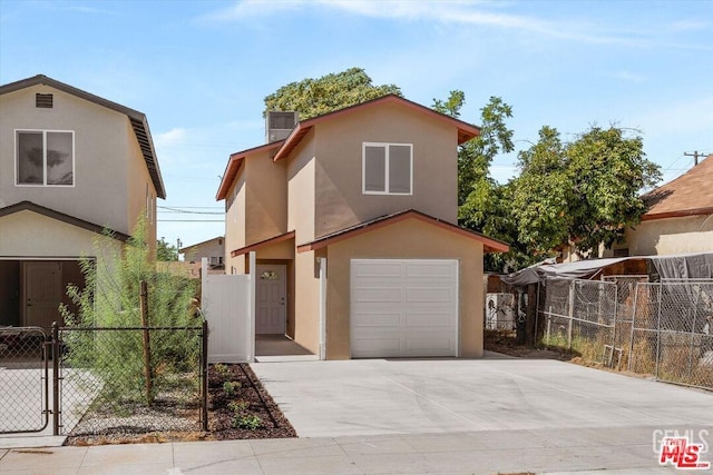 front of property with a garage