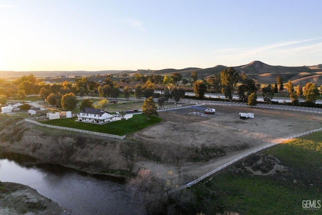 aerial view at dusk with a mountain view