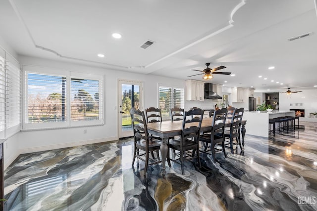 dining room featuring recessed lighting, visible vents, marble finish floor, and baseboards