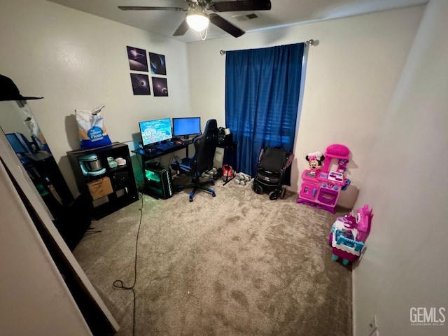 office area with carpet flooring and ceiling fan