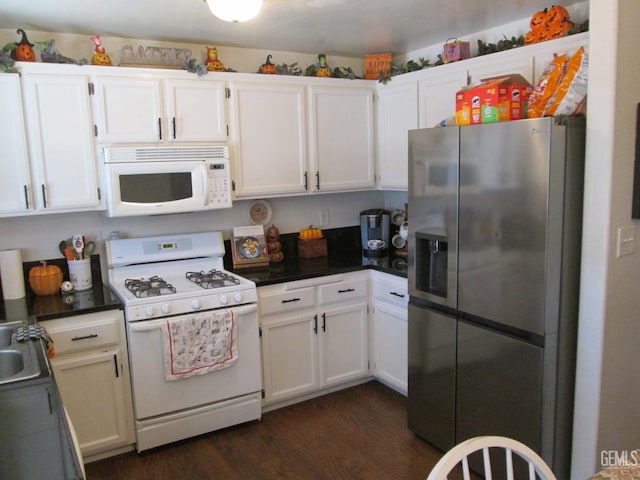 kitchen featuring white cabinetry, white appliances, and dark wood-type flooring