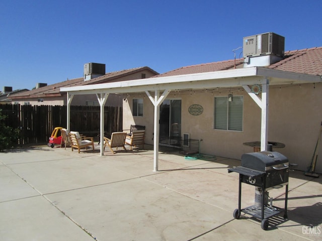 back of property featuring a patio area and central AC unit