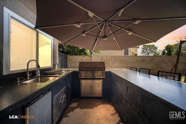 10005 Valley Forest Ct, Bakersfield, CA 93311 - view of patio / terrace featuring a sink, exterior kitchen, grilling area, and fence