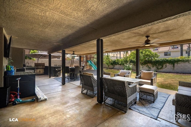 10005 Valley Forest Ct, Bakersfield, CA 93311 - view of patio featuring an outdoor living space, outdoor dining space, a fenced backyard, a ceiling fan, and a playground