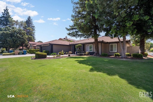 10005 Valley Forest Ct, Bakersfield, CA 93311 - ranch-style house with an attached garage, a tiled roof, a front lawn, and concrete driveway