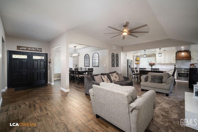 10005 Valley Forest Ct, Bakersfield, CA 93311 - living room featuring baseboards, ceiling fan, and dark wood-type flooring