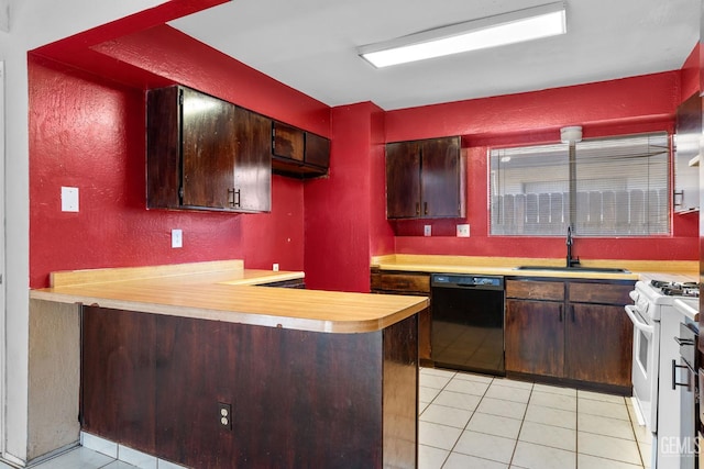 2617 Auburn Ct, Bakersfield, CA 93306 - kitchen with dishwasher, white range with gas cooktop, light tile patterned floors, light countertops, and a peninsula