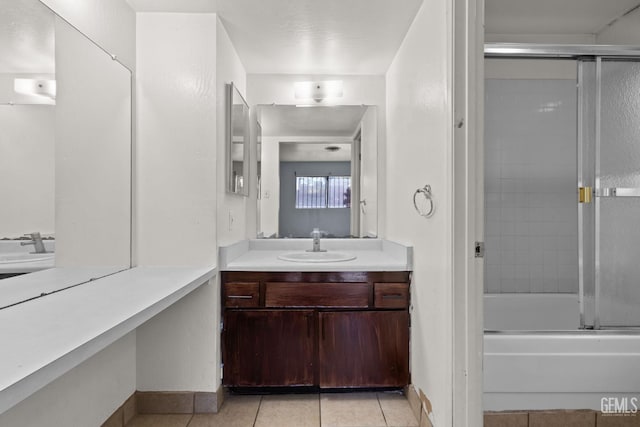 2617 Auburn Ct, Bakersfield, CA 93306 - bathroom featuring tile patterned flooring, vanity, and bath / shower combo with glass door