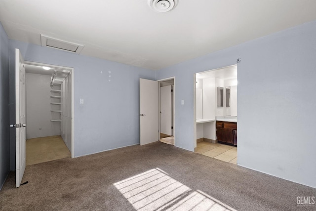 2617 Auburn Ct, Bakersfield, CA 93306 - unfurnished bedroom featuring light colored carpet, attic access, and ensuite bath