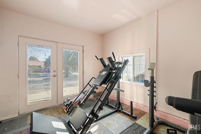 workout area featuring french doors