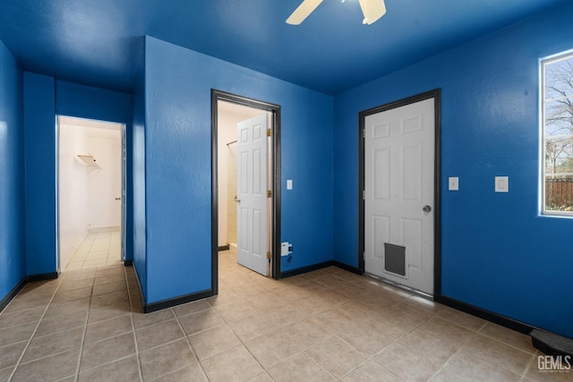 foyer with ceiling fan