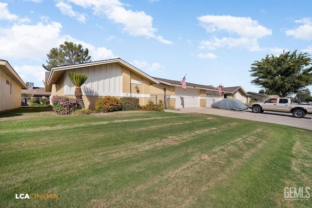 single story home with a front lawn and a garage