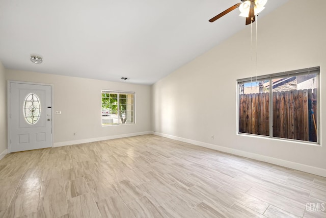 3410 Kimmie Rachelle Ct, Bakersfield, CA 93313 - entryway with a ceiling fan, light wood-type flooring, and vaulted ceiling