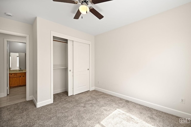 3410 Kimmie Rachelle Ct, Bakersfield, CA 93313 - unfurnished bedroom with carpet flooring, a closet, and a ceiling fan