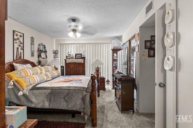 800 Lexington St Unit 28, Delano, CA 93215 - carpeted bedroom with a textured ceiling and a ceiling fan