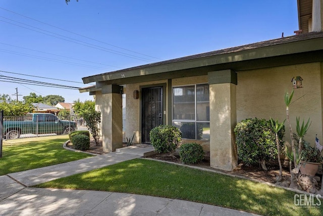 800 Lexington St Unit 28, Delano, CA 93215 - view of exterior entry with stucco siding