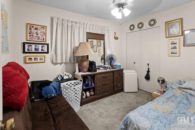 800 Lexington St Unit 28, Delano, CA 93215 - carpeted bedroom with a closet and a textured ceiling