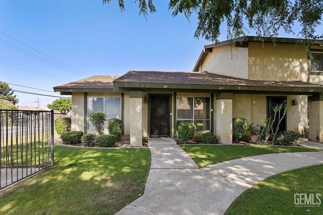 800 Lexington St Unit 28, Delano, CA 93215 - townhome / multi-family property featuring stucco siding and a shingled roof