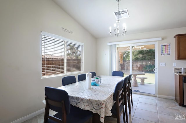 7215 Pine Flat Dr, Bakersfield, CA 93311 - dining space with a chandelier, vaulted ceiling, baseboards, and light tile patterned flooring