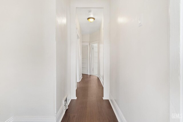 1940 S La Salle Ave, Los Angeles, CA 90018 - hall with dark wood-type flooring and baseboards