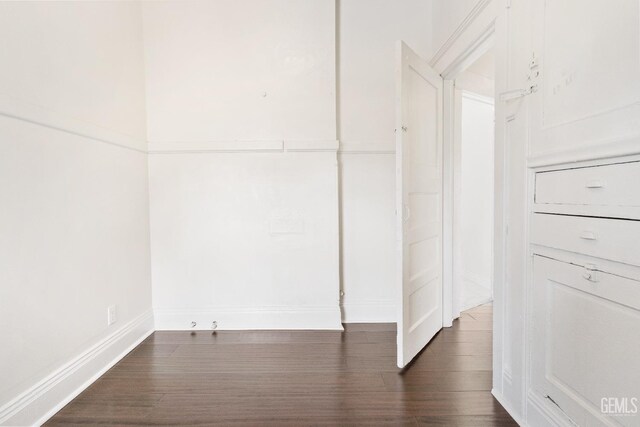 1940 S La Salle Ave, Los Angeles, CA 90018 - spare room with dark wood-style floors and baseboards