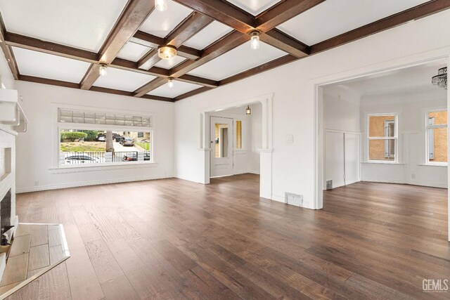 1940 S La Salle Ave, Los Angeles, CA 90018 - unfurnished living room featuring a fireplace, coffered ceiling, beam ceiling, wood finished floors, and baseboards