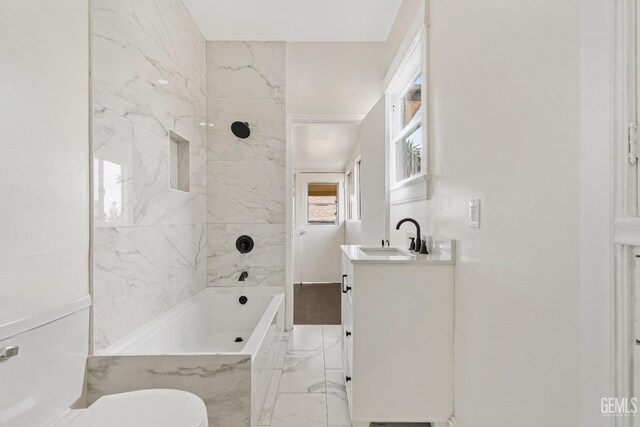 1940 S La Salle Ave, Los Angeles, CA 90018 - bathroom featuring marble look tile flooring, vanity, shower / tub combination, and toilet