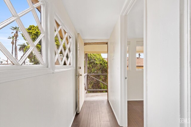 1940 S La Salle Ave, Los Angeles, CA 90018 - hallway featuring dark wood-type flooring and baseboards