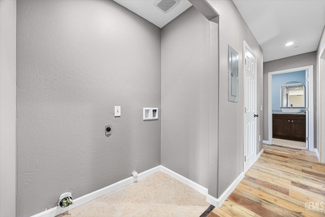 laundry room with washer hookup, visible vents, electric dryer hookup, laundry area, and baseboards