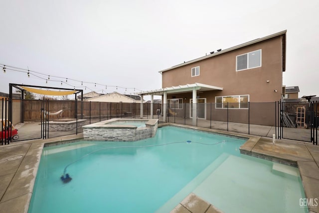 view of swimming pool featuring a fenced backyard, a gate, a pool with connected hot tub, and a pergola