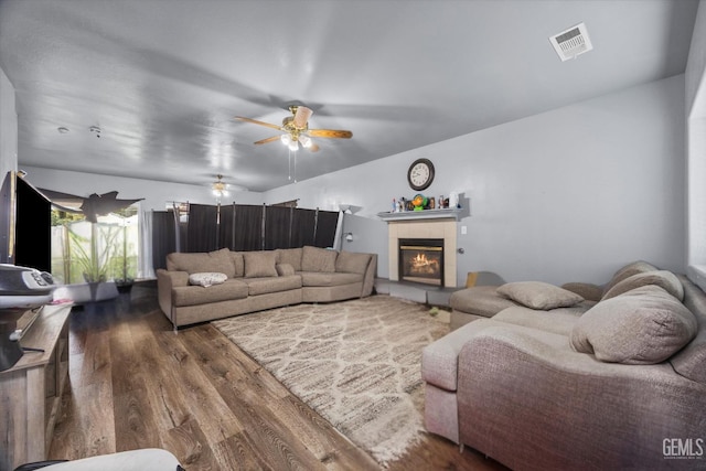 437 Rian Noelle Ct, Bakersfield, CA 93308 - living area featuring wood finished floors, a fireplace, and a ceiling fan