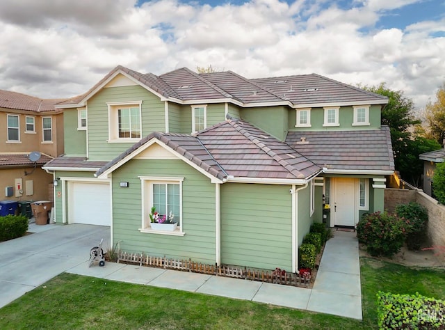 11102 Patagonia Way, Bakersfield, CA 93306 - view of front of house featuring concrete driveway, a garage, and a tiled roof