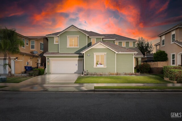 11102 Patagonia Way, Bakersfield, CA 93306 - traditional-style home with an attached garage, concrete driveway, and a lawn