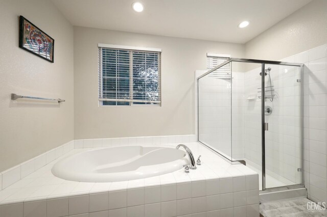 11102 Patagonia Way, Bakersfield, CA 93306 - bathroom featuring a garden tub, a stall shower, and recessed lighting