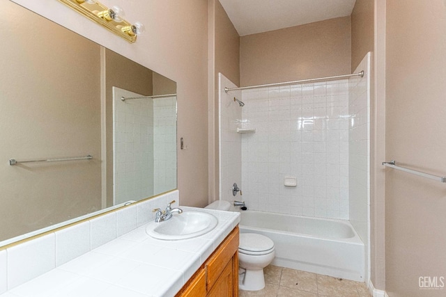 full bath featuring tile patterned flooring, washtub / shower combination, toilet, and vanity