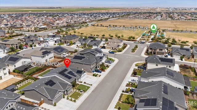 9008 Pine Breeze Ln, Shafter, CA 93263 - bedroom featuring carpet flooring, a nursery area, baseboards, and ceiling fan