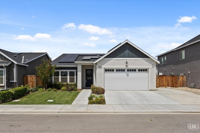 9008 Pine Breeze Ln, Shafter, CA 93263 - single story home with solar panels, a front yard, a garage, fence, and concrete driveway