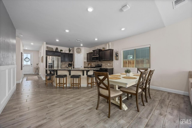 9008 Pine Breeze Ln, Shafter, CA 93263 - foyer entrance featuring recessed lighting, baseboards, visible vents, and wood finished floors