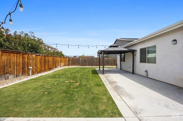 9008 Pine Breeze Ln, Shafter, CA 93263 - view of yard with a gazebo, a fenced backyard, and a patio