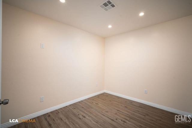 428 Center St Unit A, Taft, CA 93268 - spare room featuring wood finished floors and recessed lighting