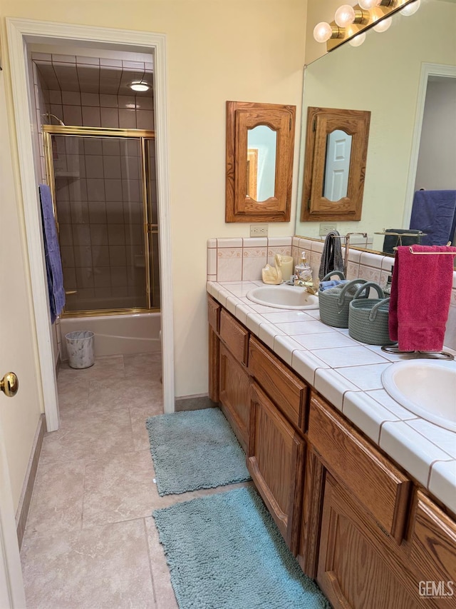 22417 Citation St, Tehachapi, CA 93561 - full bathroom with double vanity and combined bath / shower with glass door