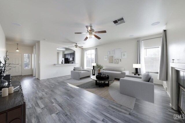 unfurnished living room featuring dark hardwood / wood-style floors