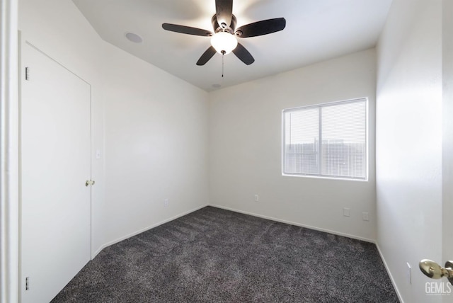 carpeted empty room with ceiling fan