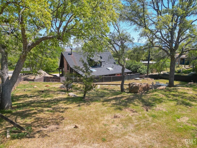 view of yard with fence