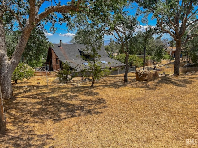 view of yard with fence